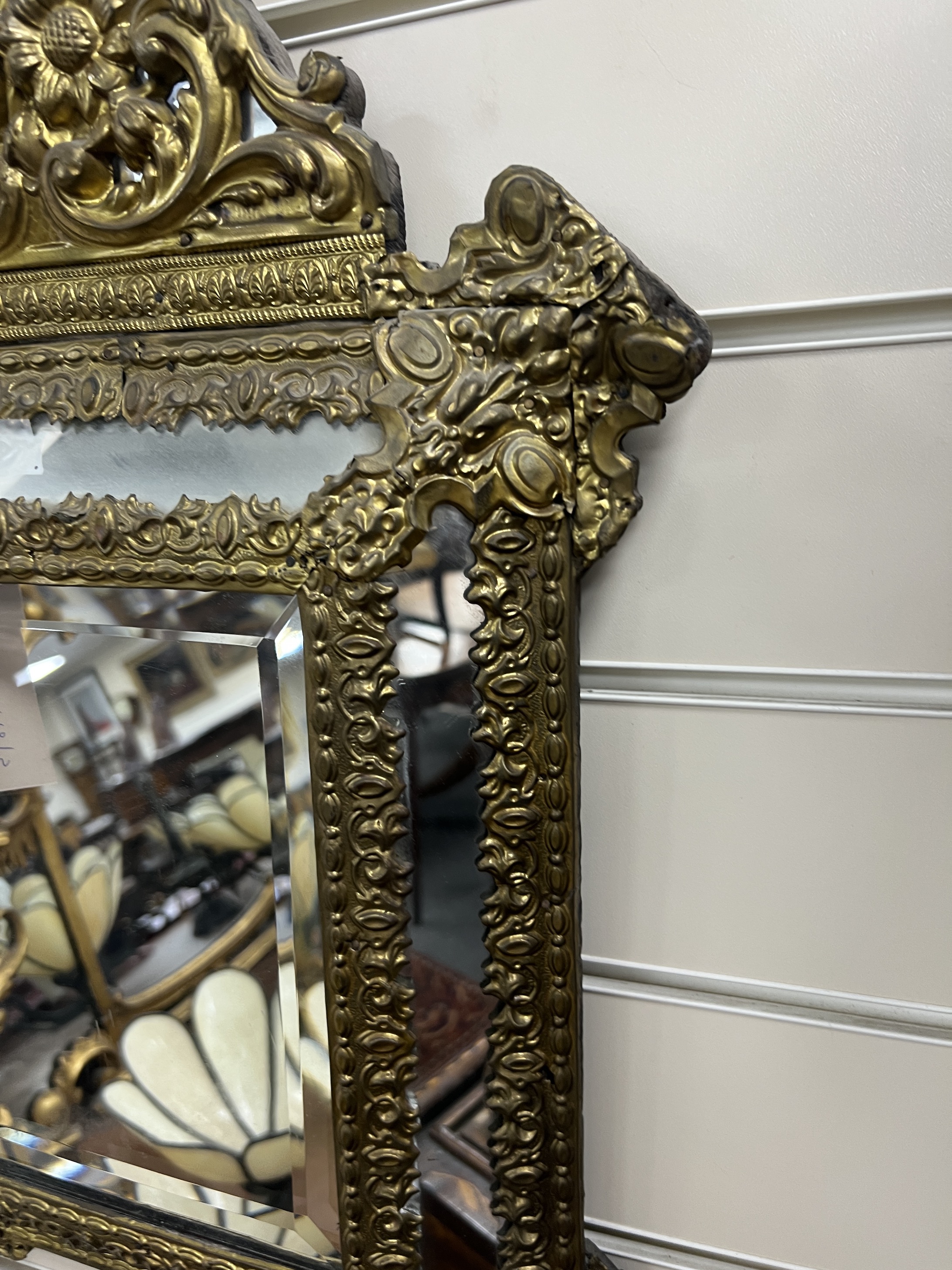 A 19th century French embossed brass wall mirror, width 39cm, height 54cm